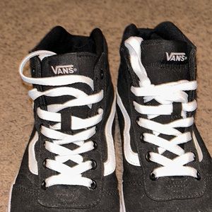 Vans black/white high tops.